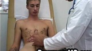 This sexy hunk is jerked off by the stud doctor porn video